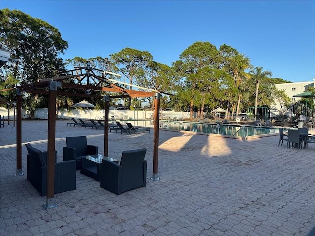 view of patio / terrace featuring a community pool