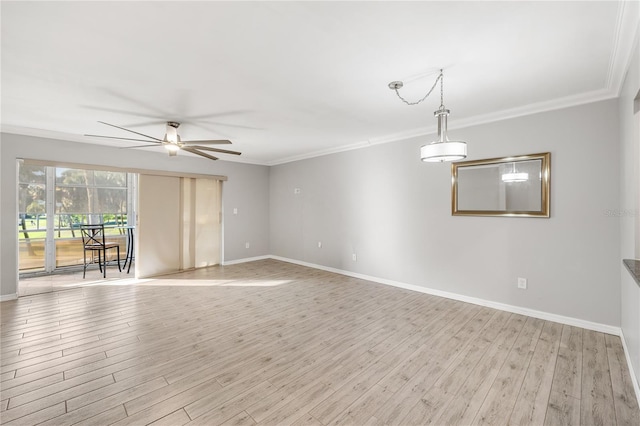 unfurnished room featuring light hardwood / wood-style flooring, ornamental molding, and ceiling fan