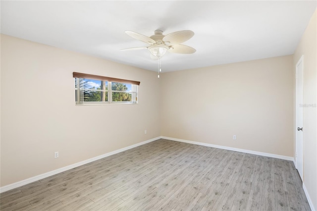 unfurnished room with ceiling fan and light hardwood / wood-style flooring