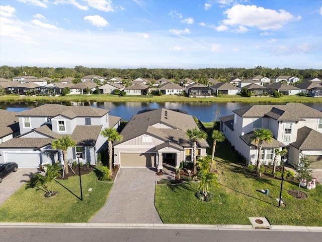 drone / aerial view featuring a water view