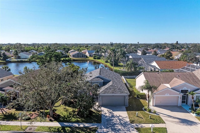 drone / aerial view featuring a water view