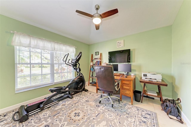 office featuring ceiling fan and light tile patterned floors