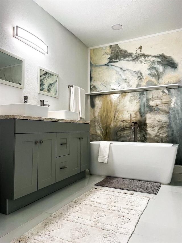 bathroom featuring a bathing tub and vanity