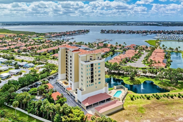 birds eye view of property featuring a water view