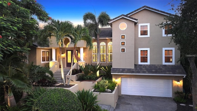 view of front of property with a garage