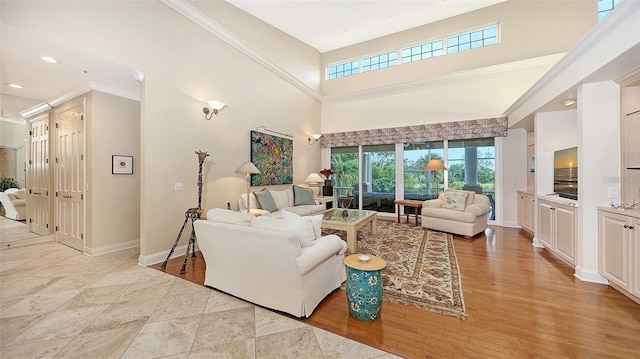 living room with a towering ceiling