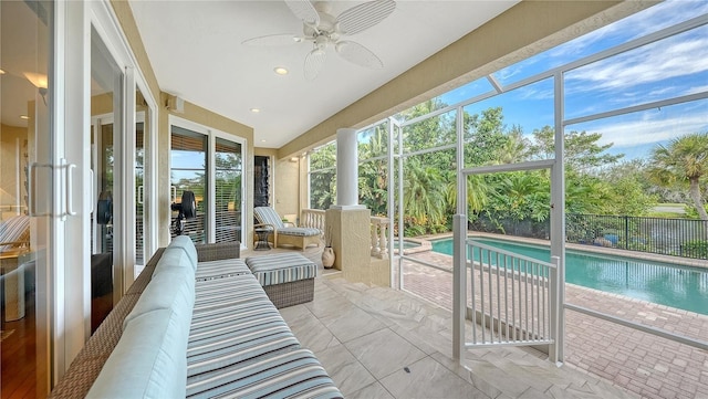 sunroom / solarium with ceiling fan