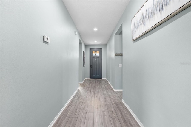 hallway featuring light hardwood / wood-style floors