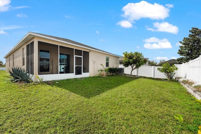 view of yard featuring a sunroom