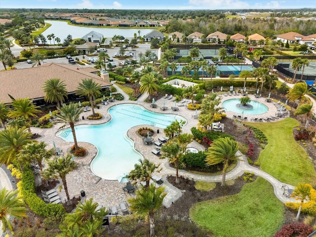 view of pool featuring a water view