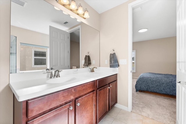 bathroom with vanity and tile patterned floors