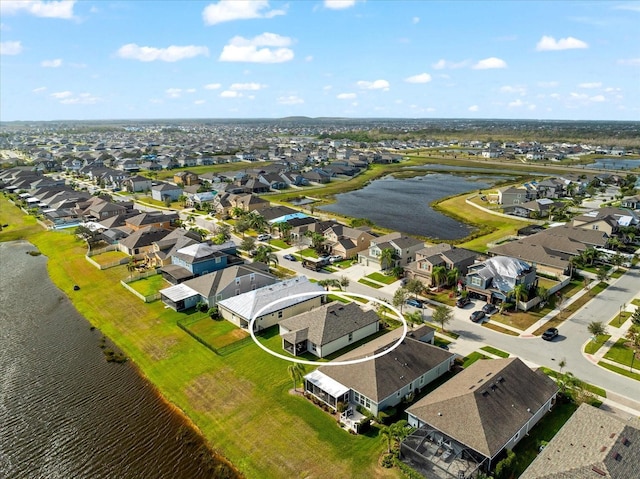 drone / aerial view featuring a water view