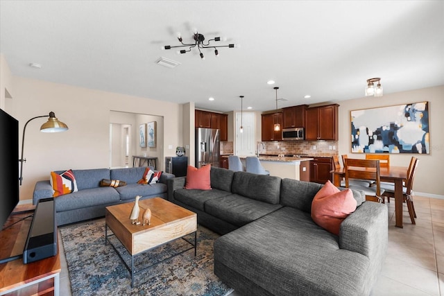 tiled living room featuring sink