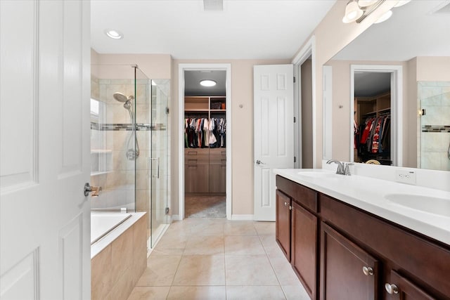 bathroom featuring vanity, separate shower and tub, and tile patterned flooring