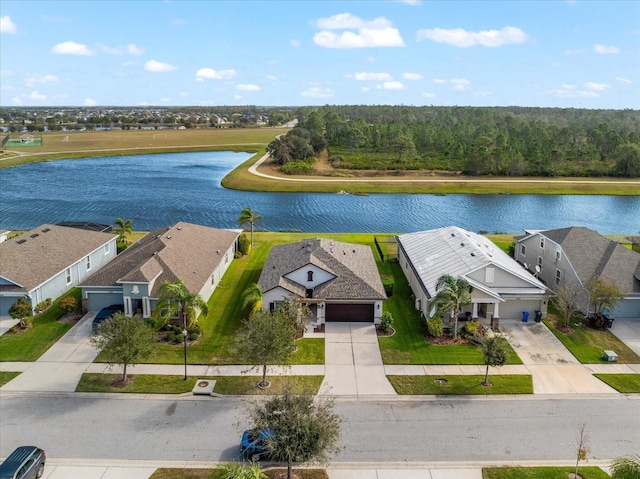 drone / aerial view with a water view