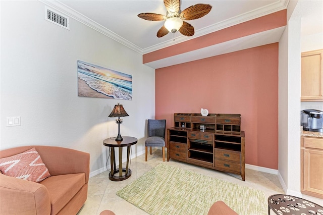 living area with ceiling fan, light tile patterned floors, and ornamental molding