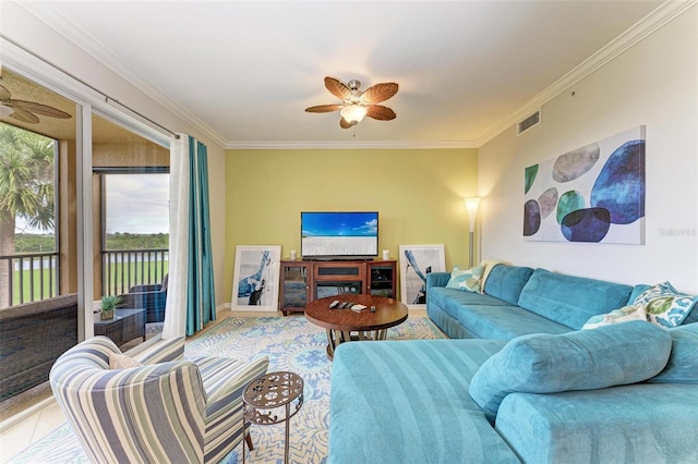 living room featuring ceiling fan, crown molding, and light tile patterned flooring