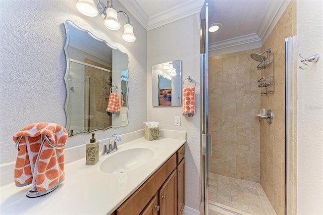 bathroom with vanity, walk in shower, and crown molding