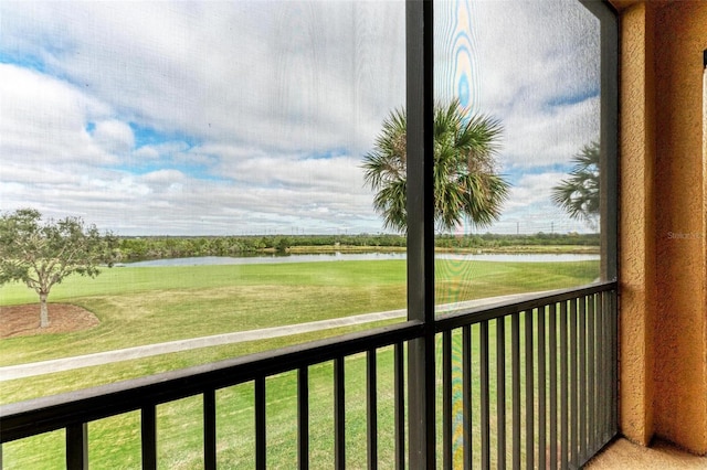 balcony featuring a water view