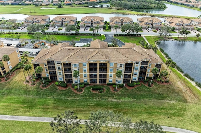 drone / aerial view with a water view