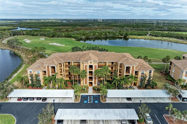 drone / aerial view with a water view