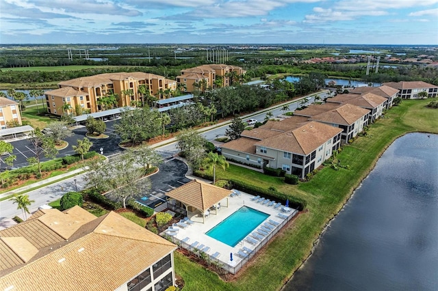 birds eye view of property featuring a water view