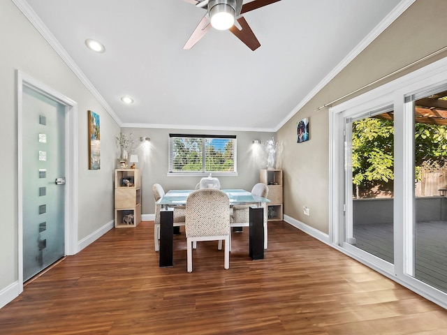 dining area featuring hardwood / wood-style floors, ornamental molding, and ceiling fan