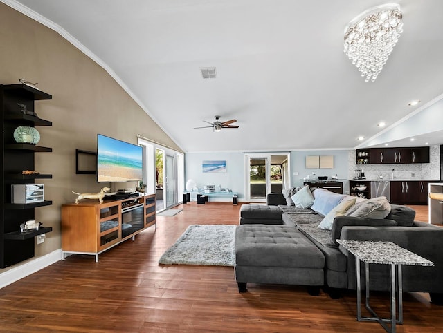 living room with crown molding, dark wood-type flooring, high vaulted ceiling, and ceiling fan with notable chandelier