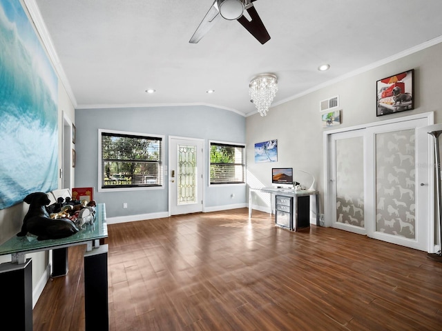 5645 Churchill Downs Rd, Sarasota, FL 34241 - living area featuring crown molding, a chandelier, a ceiling fan, lofted ceiling, and baseboards