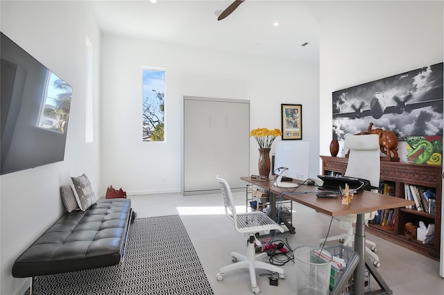 home office with a ceiling fan and recessed lighting