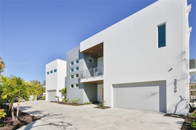 exterior space featuring an attached garage and driveway