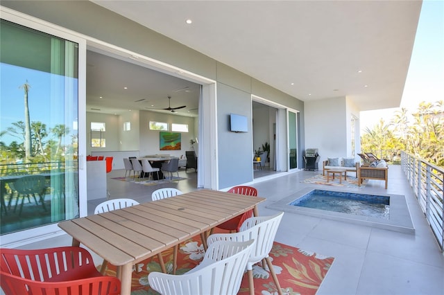 balcony featuring outdoor dining space