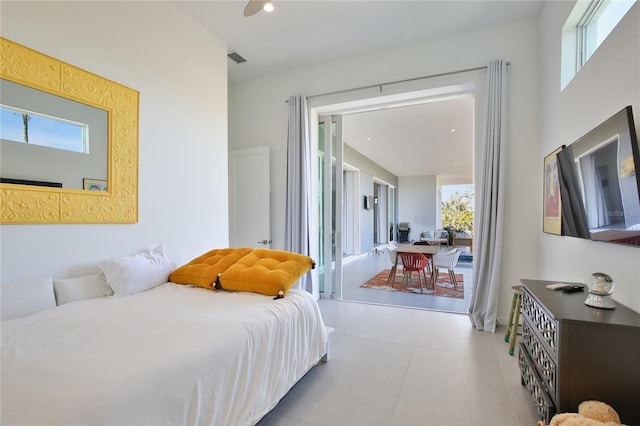 bedroom featuring access to exterior, tile patterned flooring, and visible vents