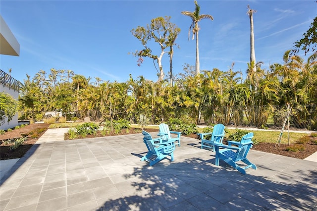 view of patio / terrace featuring fence