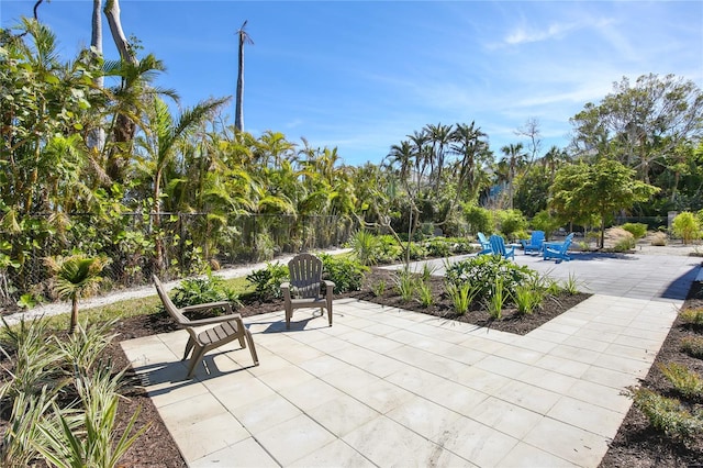 view of patio featuring fence