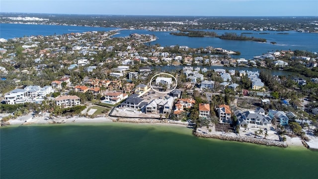 aerial view with a residential view and a water view