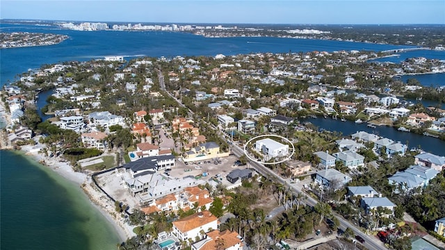 bird's eye view with a water view and a residential view