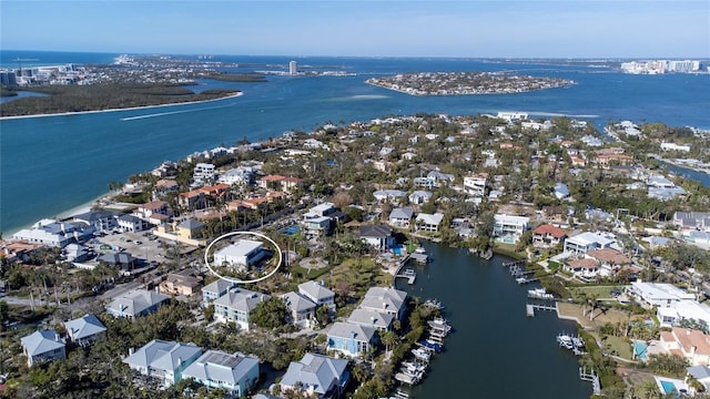 aerial view featuring a residential view and a water view