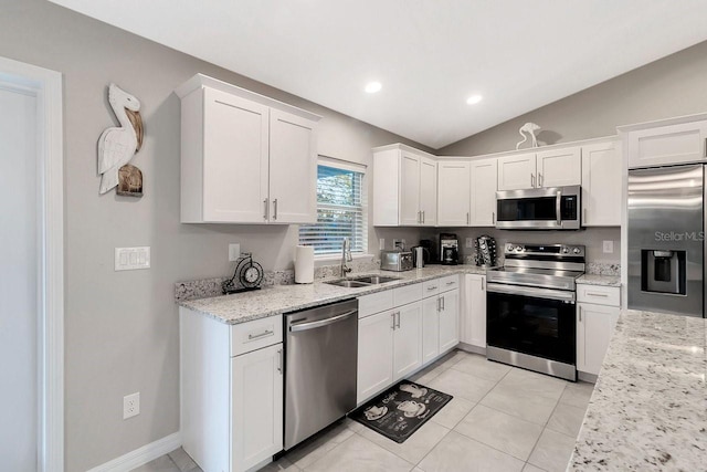 kitchen with white cabinetry, appliances with stainless steel finishes, and sink