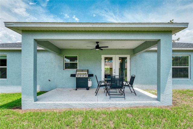 view of patio / terrace with area for grilling, french doors, and ceiling fan