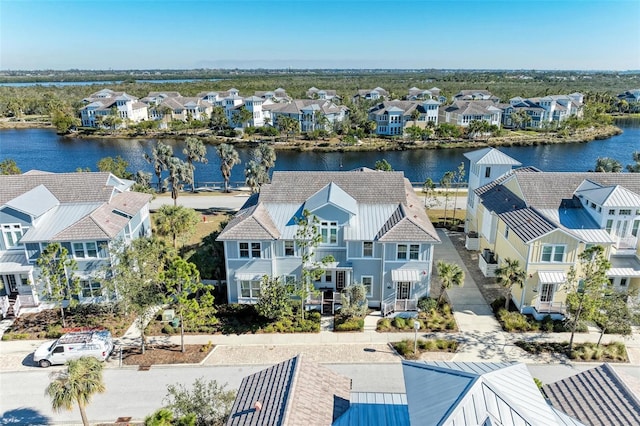 drone / aerial view with a water view