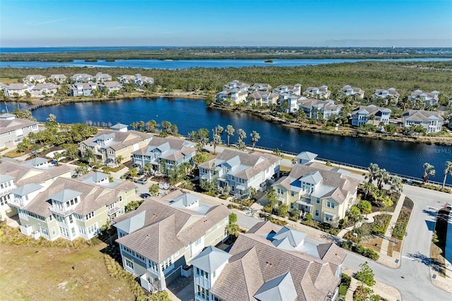 drone / aerial view with a water view