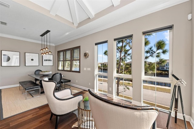 interior space with lofted ceiling with beams, ornamental molding, a chandelier, and hardwood / wood-style flooring