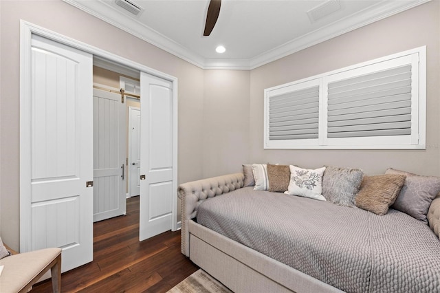 bedroom with ceiling fan, dark wood-type flooring, and ornamental molding