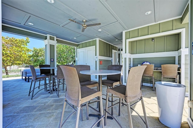 view of patio / terrace featuring ceiling fan