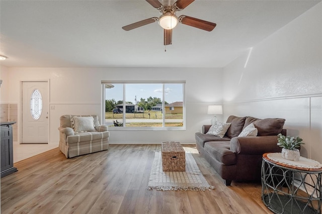 625 Ennis Ter NW, Port Charlotte, FL 33952 - living room featuring light wood-type flooring and a ceiling fan