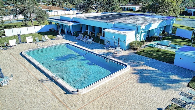 view of swimming pool featuring a patio area