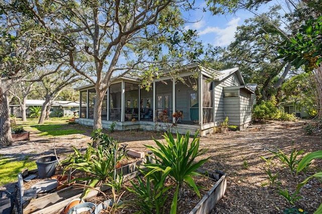 exterior space with a sunroom