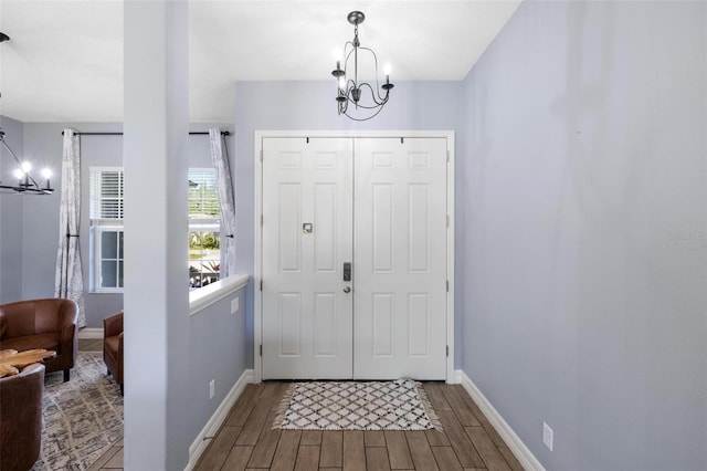 entrance foyer with an inviting chandelier