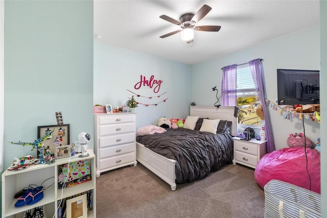 carpeted bedroom featuring ceiling fan